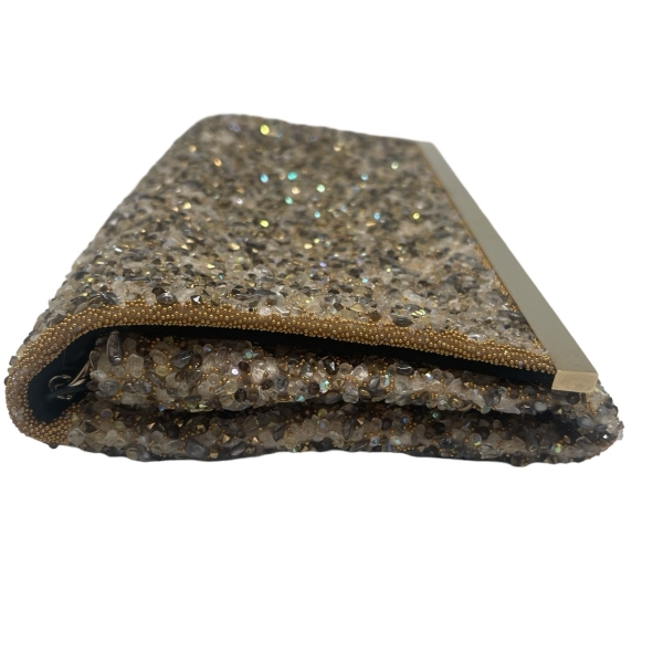 Gold and silver embellished clutch bag with crystal beading and a metallic bar detail on the front flap.